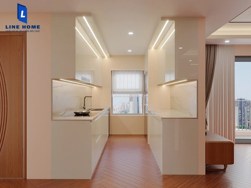 Bố trí đèn LED cảm ứng dưới gầm tủ bếp trên giúp cung cấp đủ ánh sáng cho khu vực sơ chế và nấu nướng